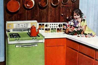 1960s kitchen decor with green oven and orange cabinets at ClickAmericana com