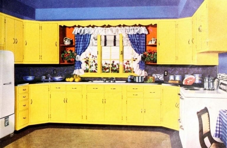 Old-fashioned yellow kitchen with blue accents (1950)